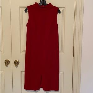 Red Yansi Fugal sleeveless mock neck dress.